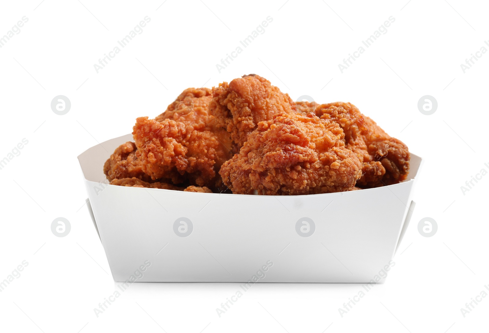 Photo of Tasty deep fried chicken pieces isolated on white