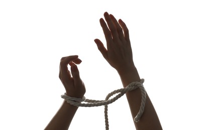 Photo of Freedom concept. Woman with tied arms on white background, closeup