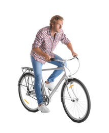 Photo of Handsome young man riding bicycle on white background