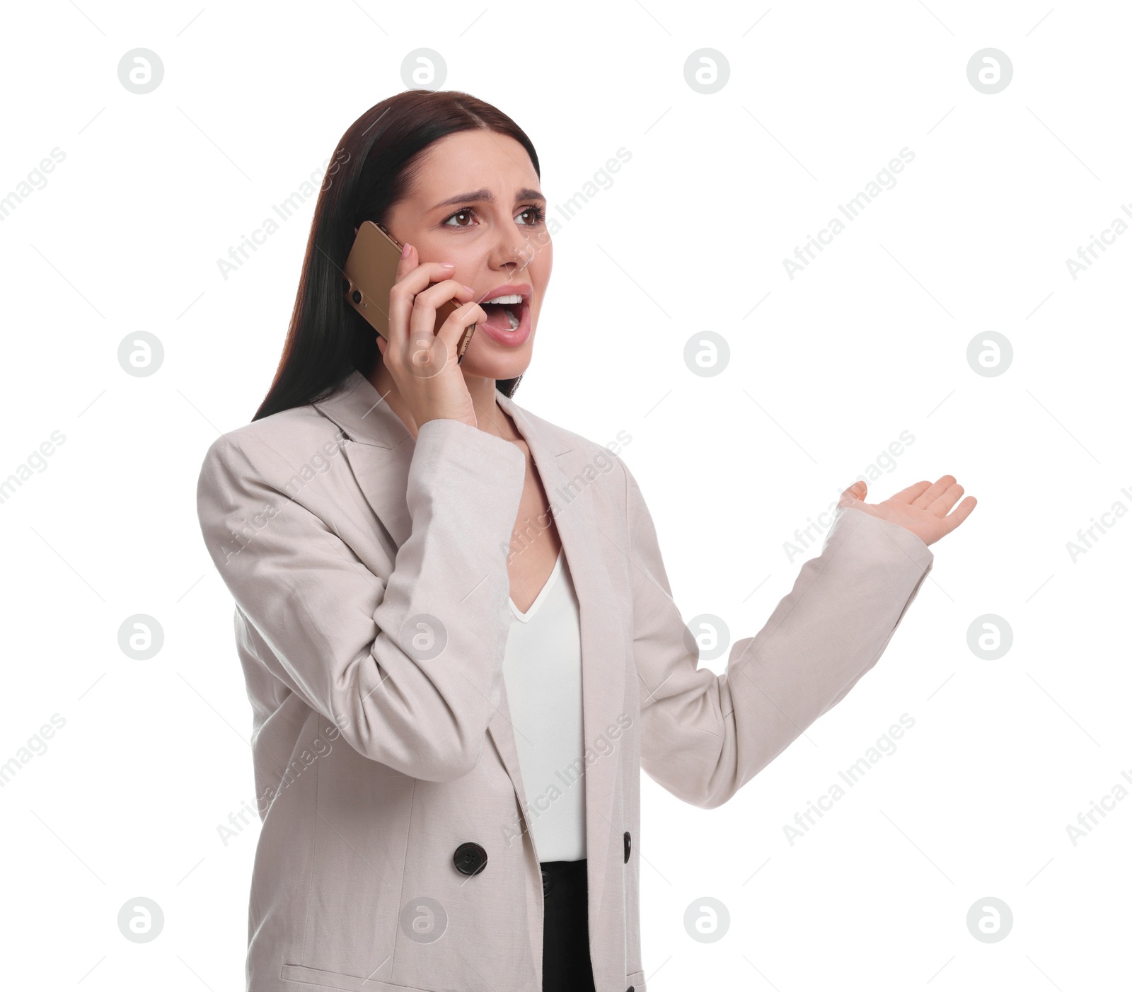 Photo of Beautiful businesswoman in suit talking on smartphone against white background