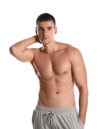 Photo of Young man with slim body on white background