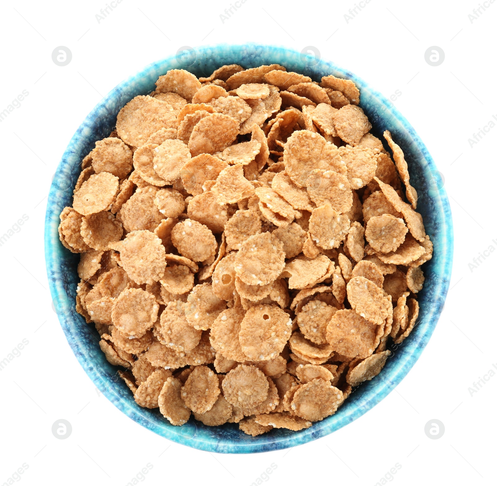 Photo of Bowl with wheat flakes on white background. Healthy grains and cereals