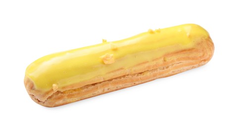 Photo of Delicious eclair covered with yellow glaze isolated on white