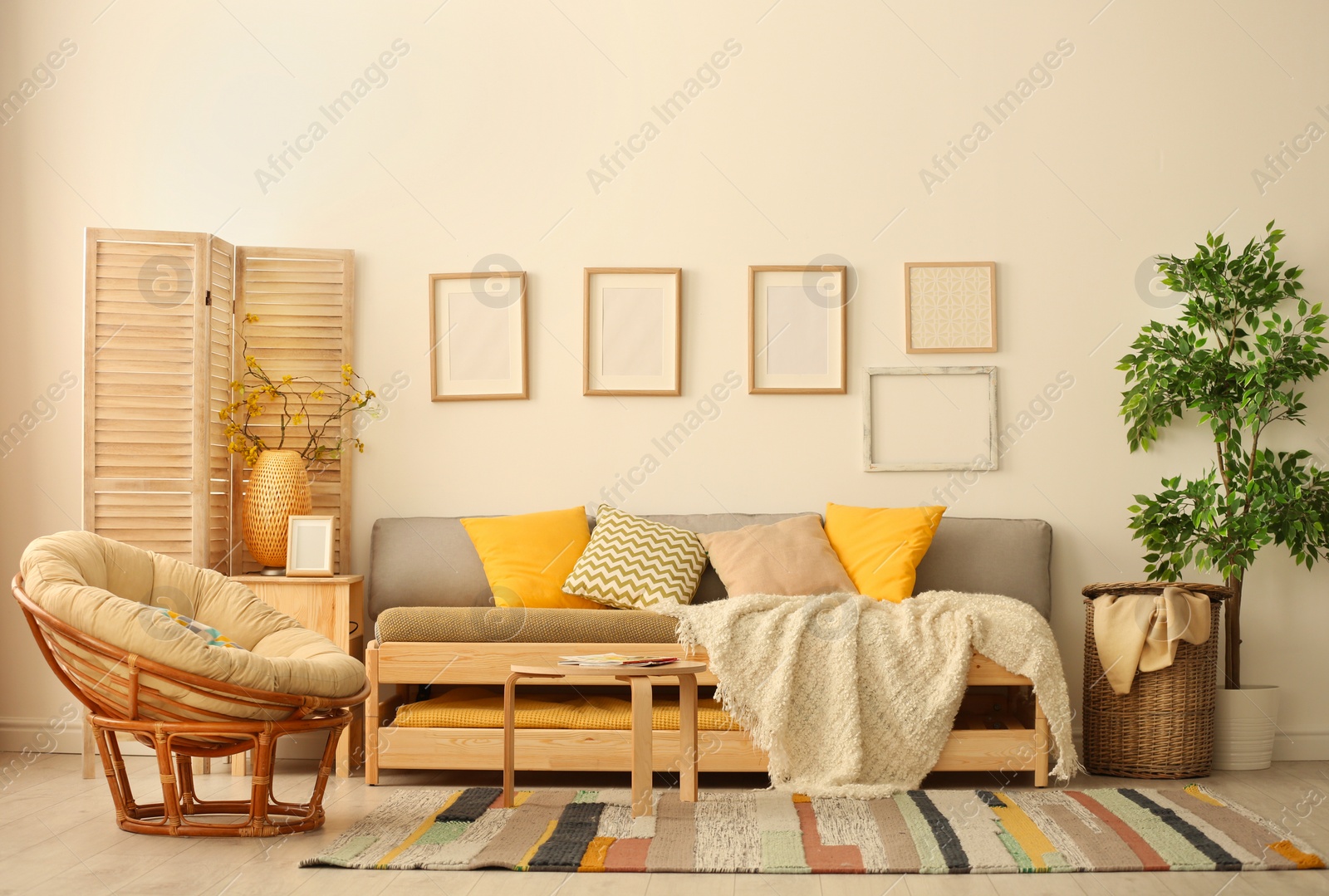 Photo of Stylish living room interior with comfortable sofa