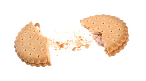 Photo of Broken tasty sandwich cookie with cream on white background