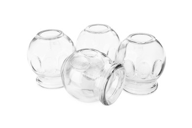 Photo of Many glass cups isolated on white. Cupping therapy