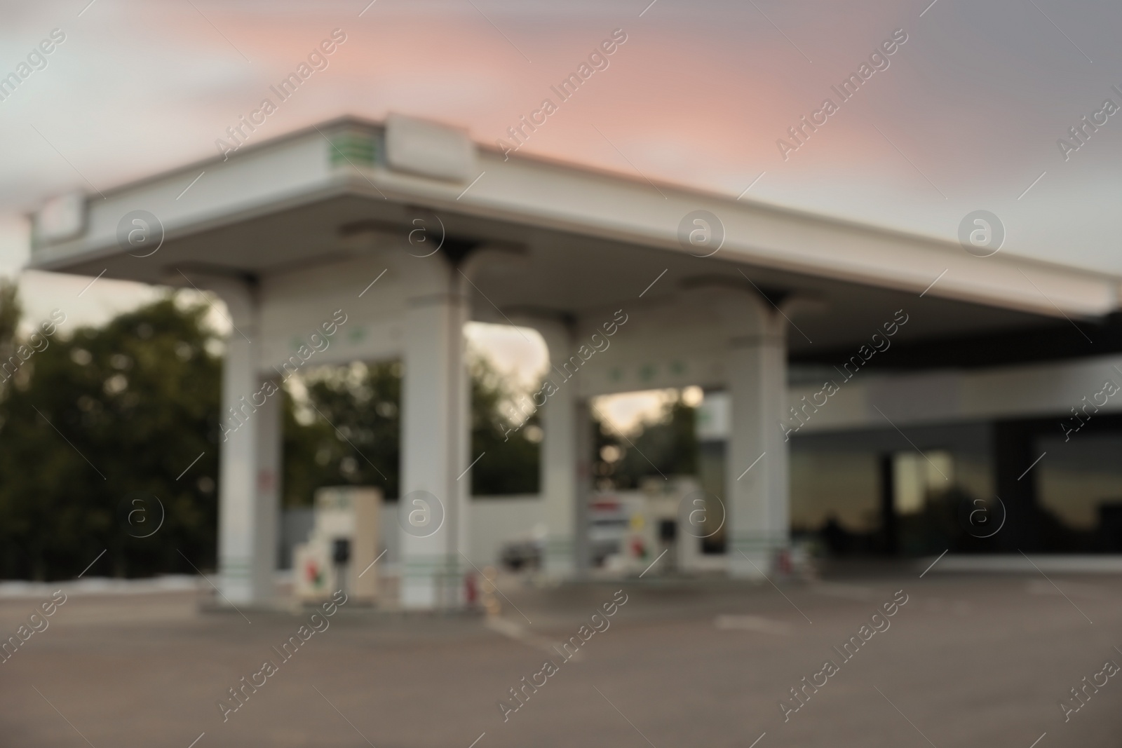 Photo of Blurred view of modern gas station outdoors