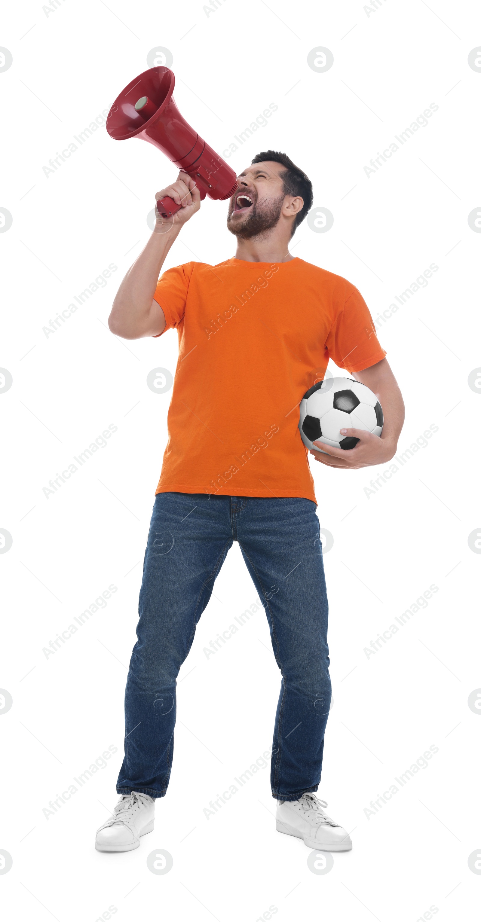 Photo of Emotional sports fan with ball and megaphone celebrating on white background