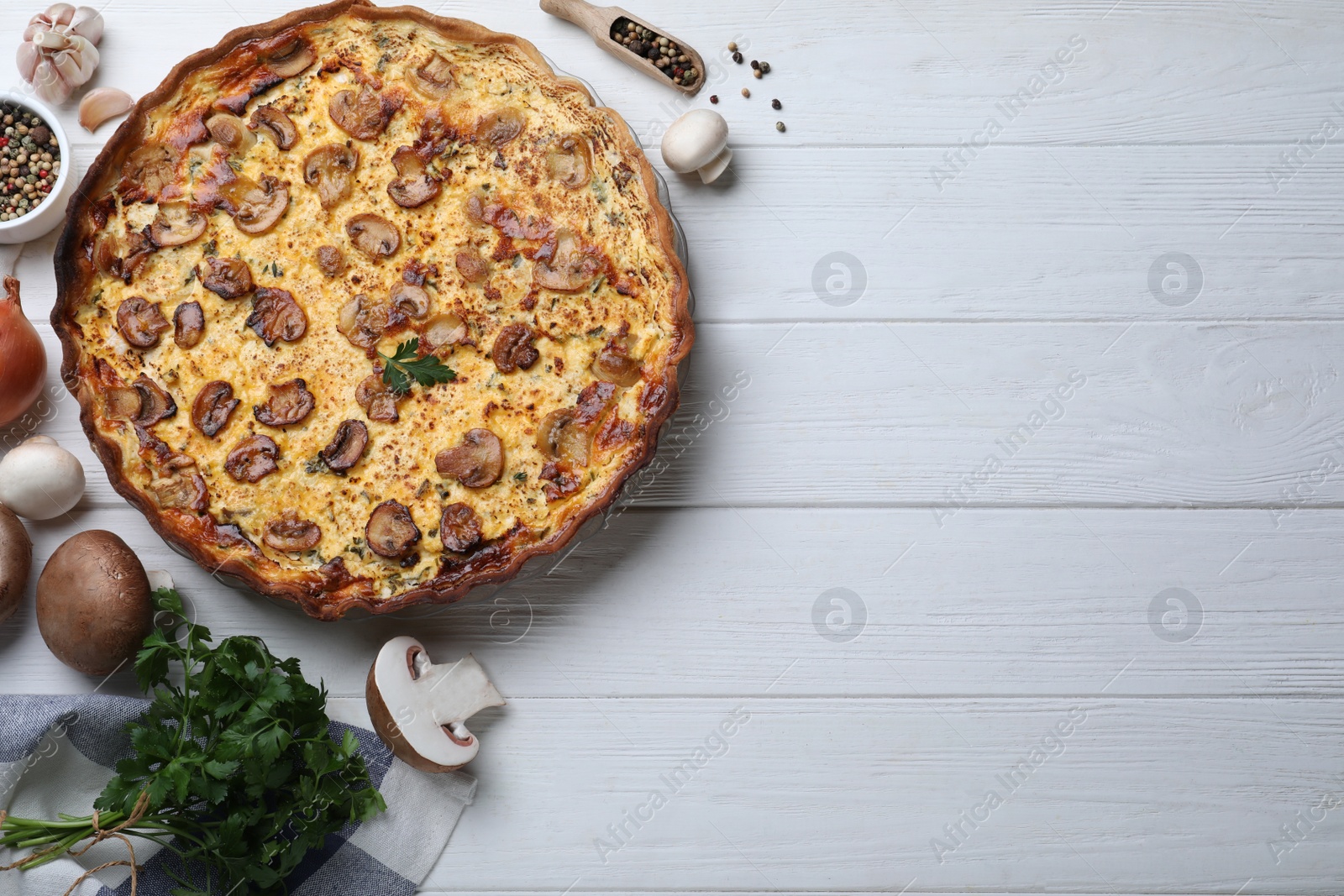 Photo of Flat lay composition with delicious homemade mushroom pie on white wooden table, space for text