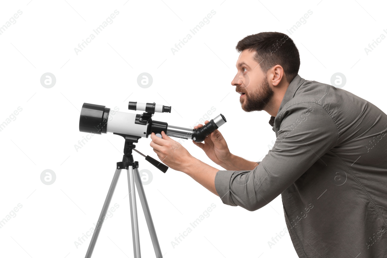 Photo of Focused astronomer with telescope on white background