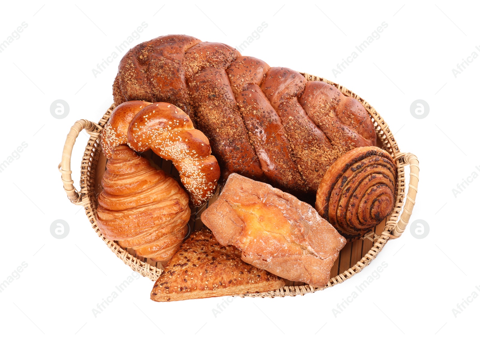 Photo of Different tasty pastries in wicker basket isolated on white, top view