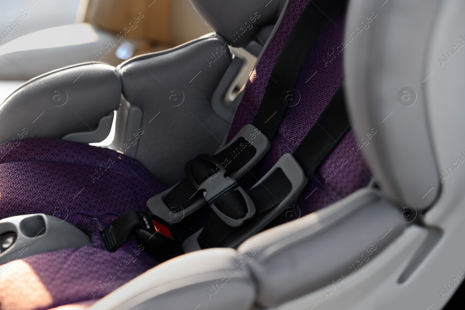 Photo of Empty modern child safety seat inside car