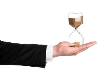 Photo of Businessman holding hourglass on white background. Time concept