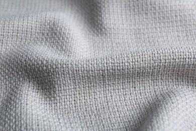 Photo of Texture of beautiful light fabric as background, closeup