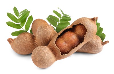 Delicious ripe tamarinds on white background. Exotic fruit