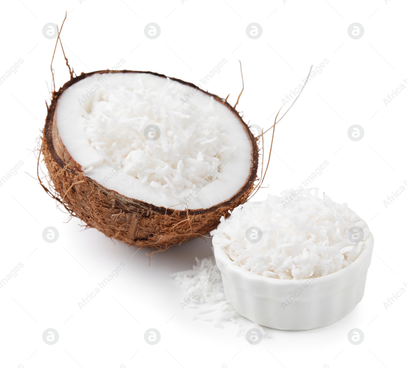 Photo of Coconut flakes and nut isolated on white