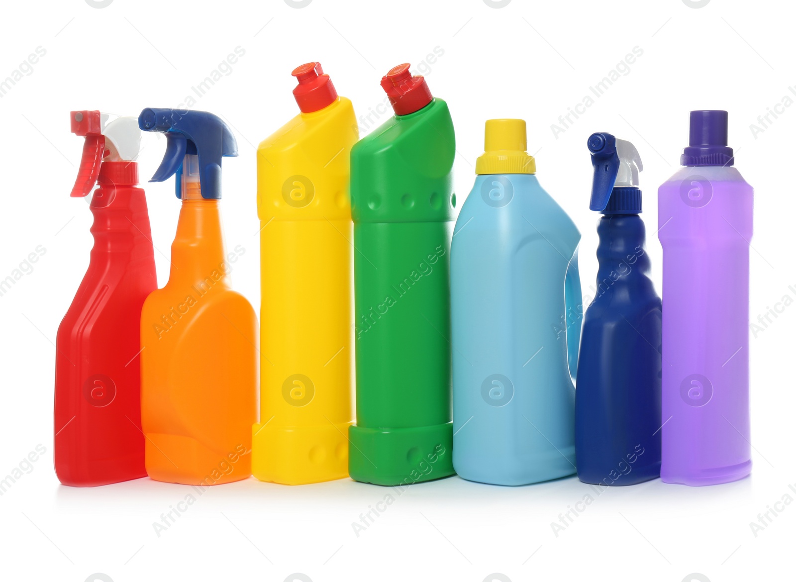 Photo of Bottles of different cleaning products on white background