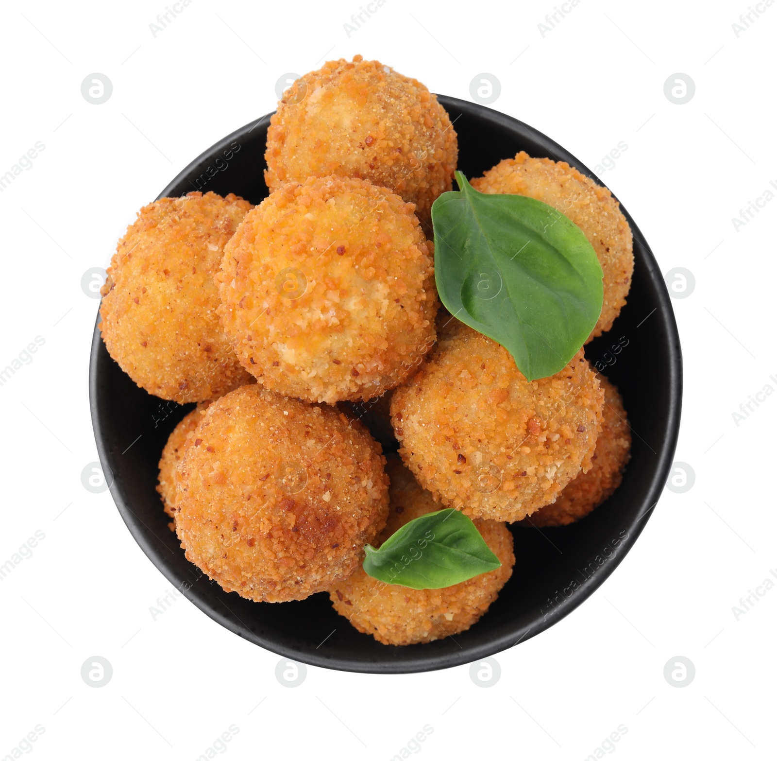 Photo of Bowl with delicious fried tofu balls and basil on white background, top view