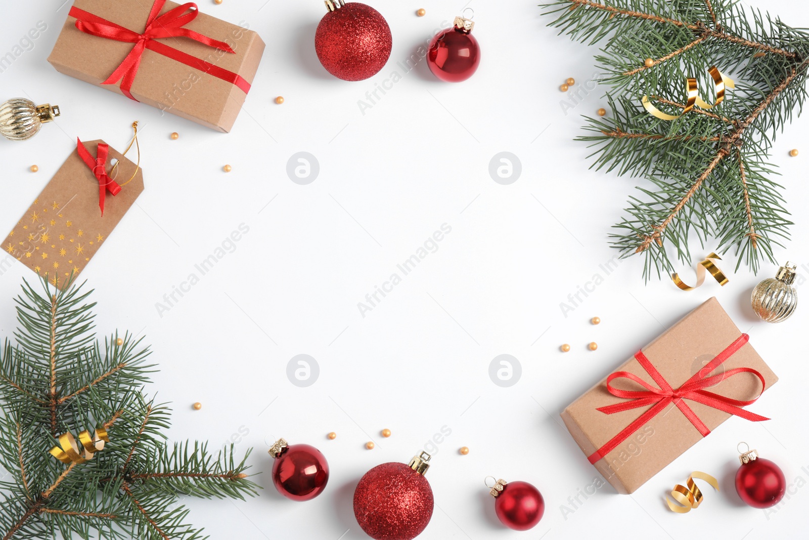 Photo of Fir tree branches with Christmas decoration on white background, top view. Space for text