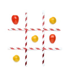 Photo of Tic tac toe game made with cherry tomatoes isolated on white, top view