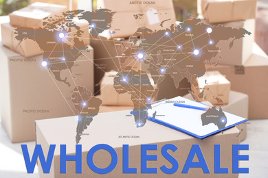 Image of Wholesale business. World map and blurred parcel boxes on background