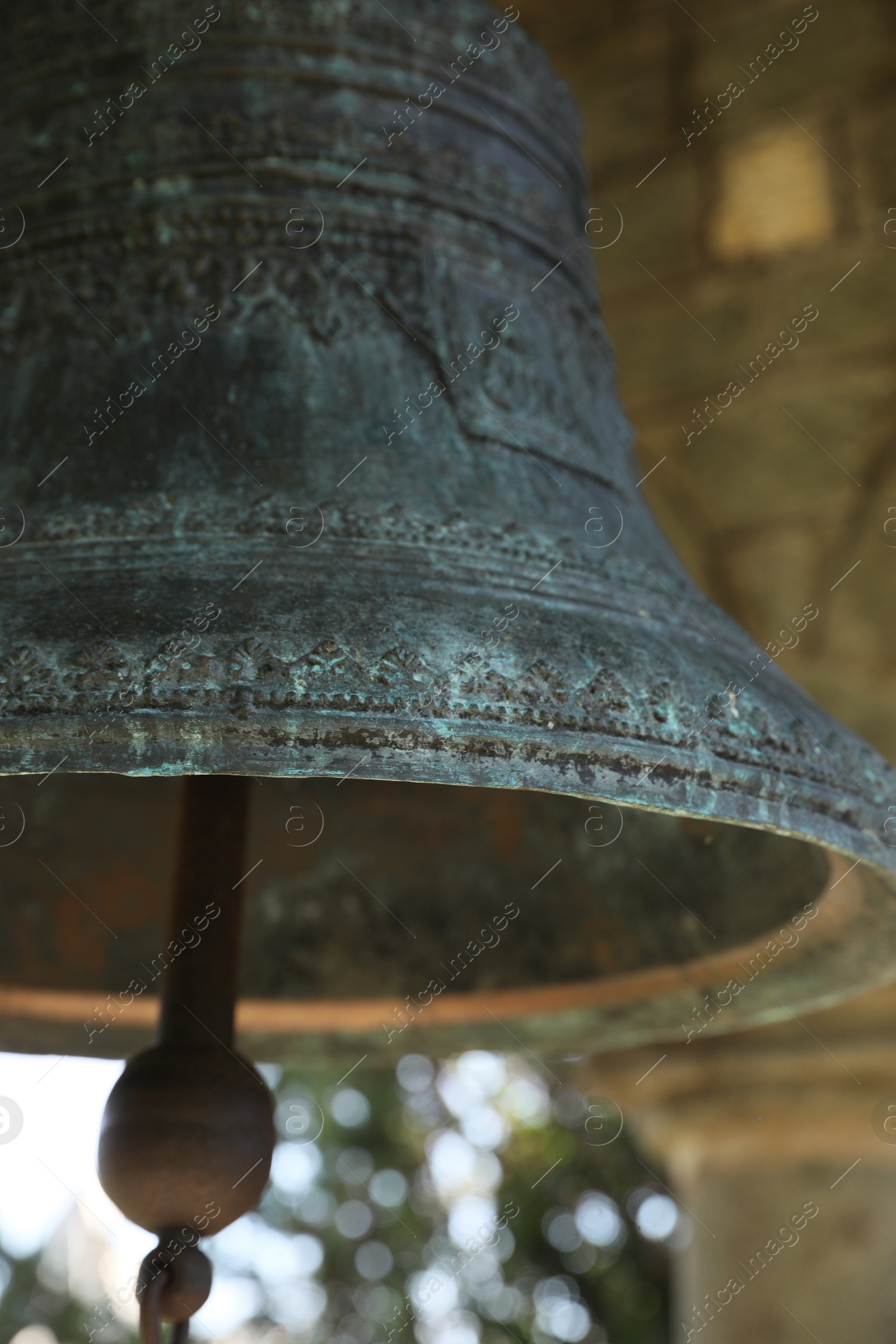 Photo of Closeup view of large old bell in tower