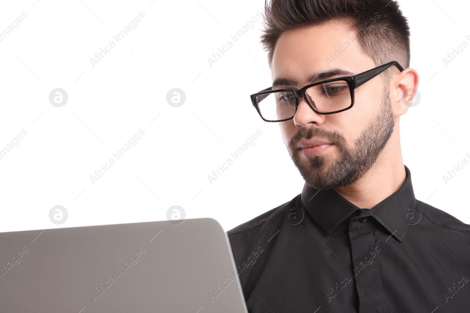 Photo of Young businessman with laptop on white background