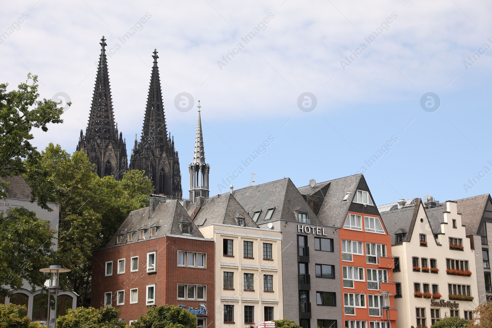 Photo of Cologne, Germany - August 28, 2022: Beautiful residential buildings on city street