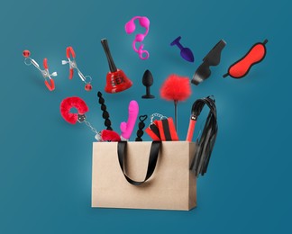 DIfferent sex toys and accessories falling into paper shopping bag on blue background
