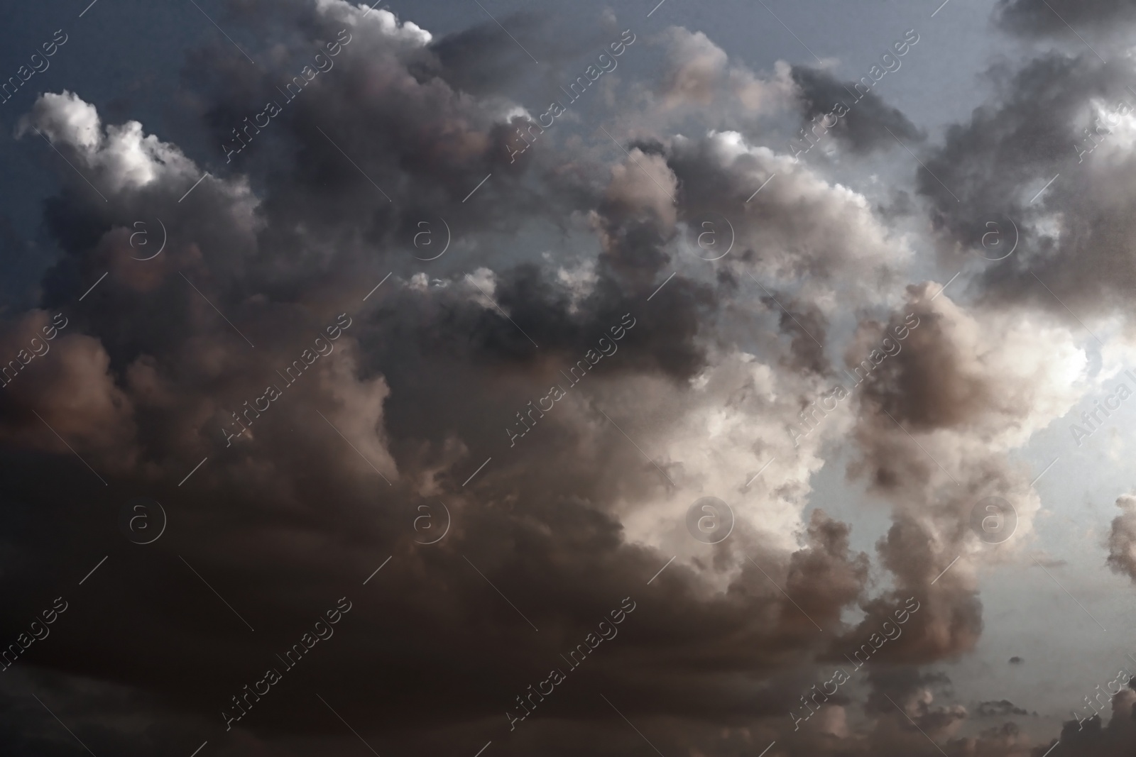 Image of Sky covered with rainy clouds. Stormy weather