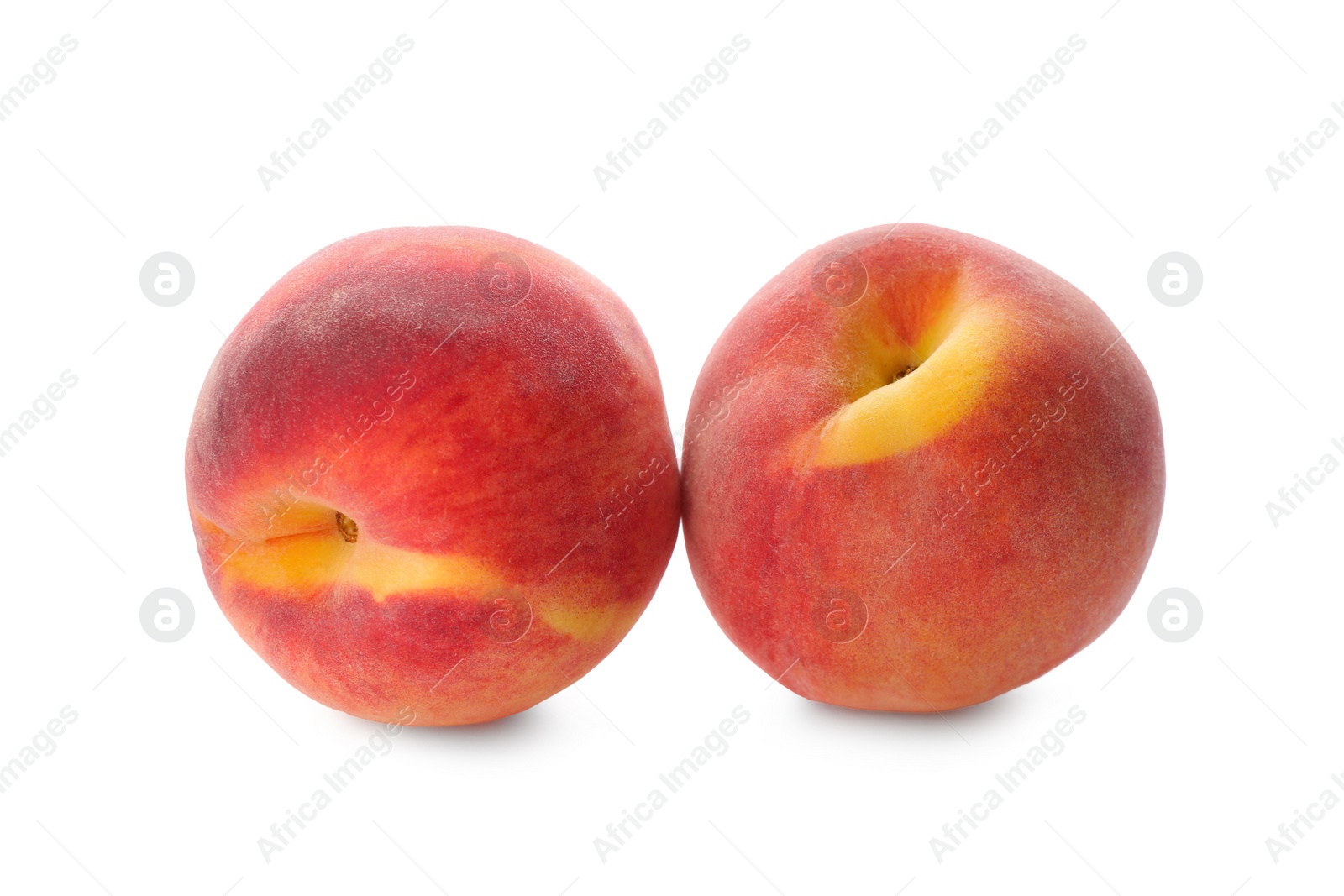 Photo of Delicious ripe juicy peaches isolated on white