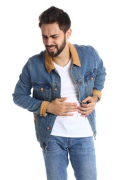 Photo of Man suffering from stomach pain on white background