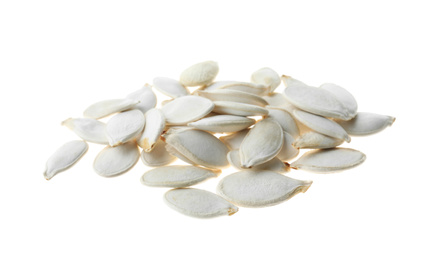 Photo of Pile of raw pumpkin seeds isolated on white. Vegetable planting