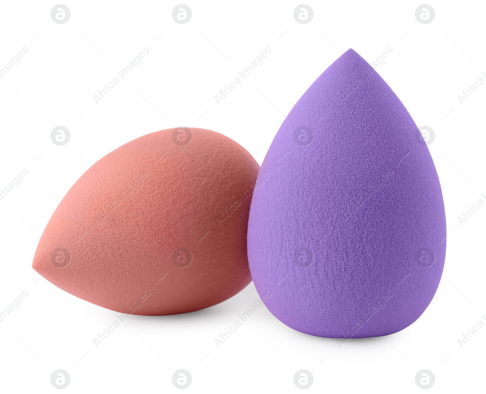 Photo of Two different make up sponges isolated on white