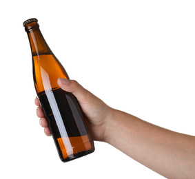 Man holding brown bottle with beer on white background, closeup