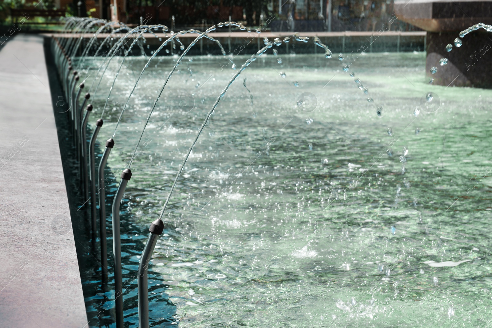 Photo of View of beautiful fountain on sunny day