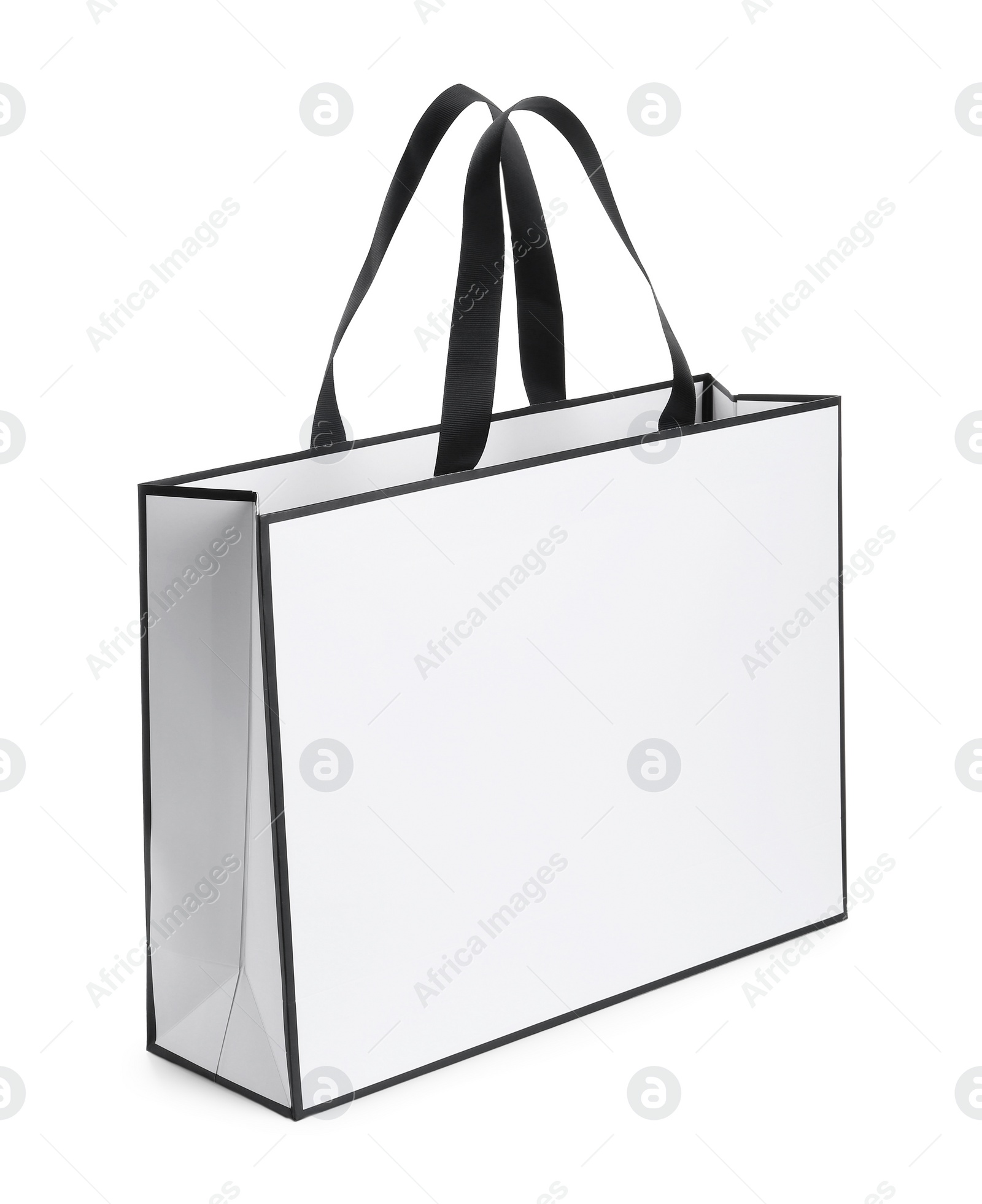 Photo of One paper bag isolated on white. Mockup for design