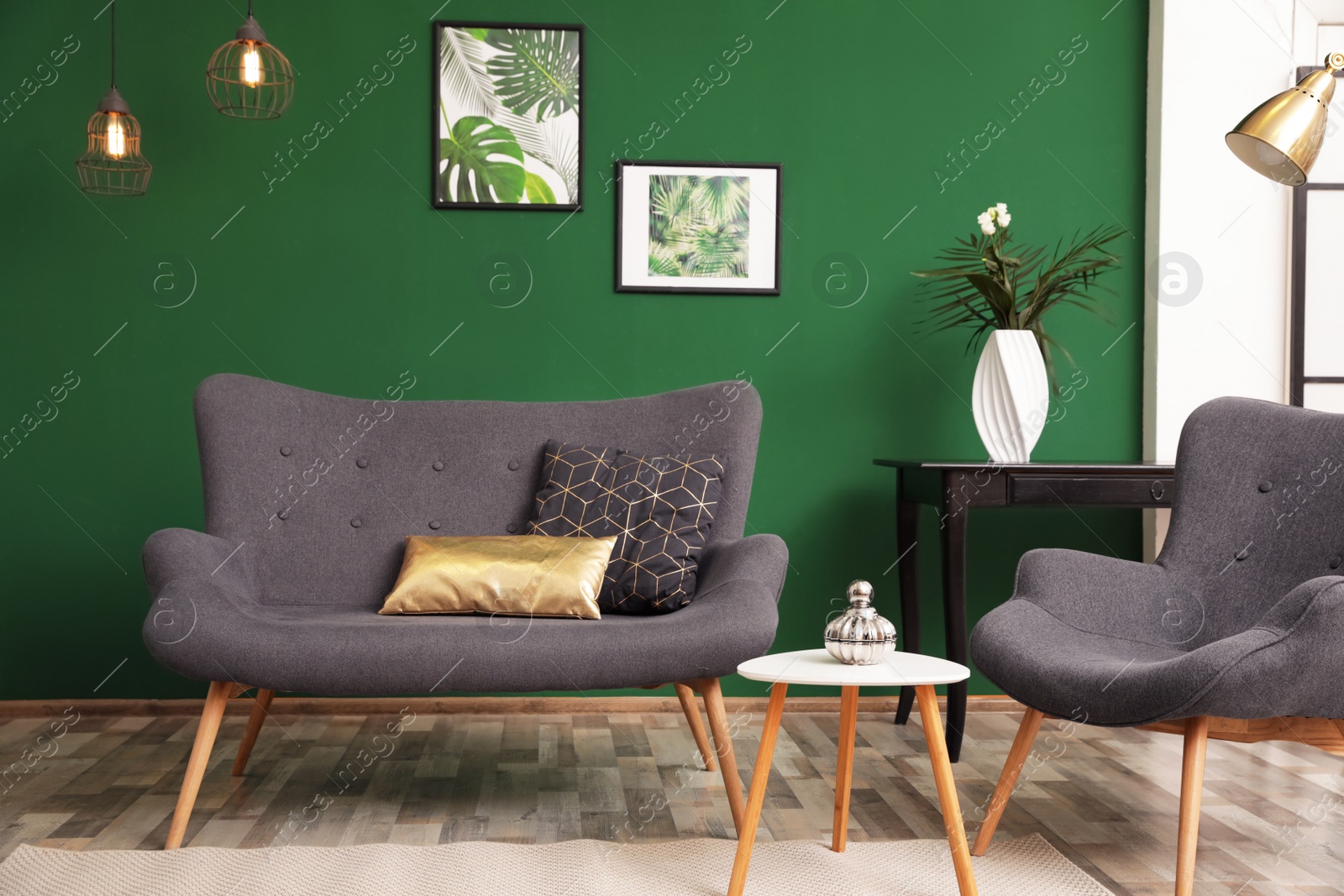 Photo of Modern living room interior stylish sofa near green wall