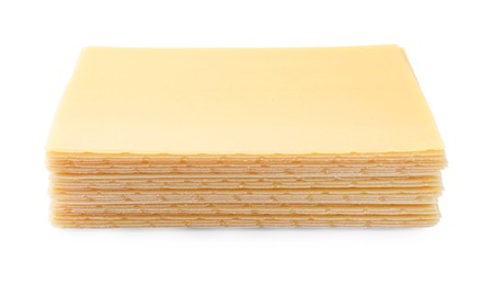 Stack of uncooked lasagna sheets isolated on white