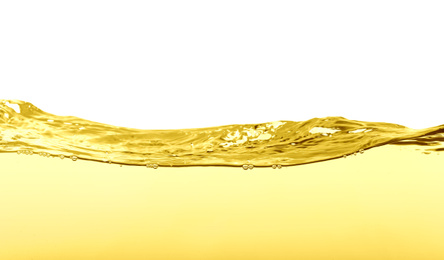 Image of Flow of natural cooking oil on white background