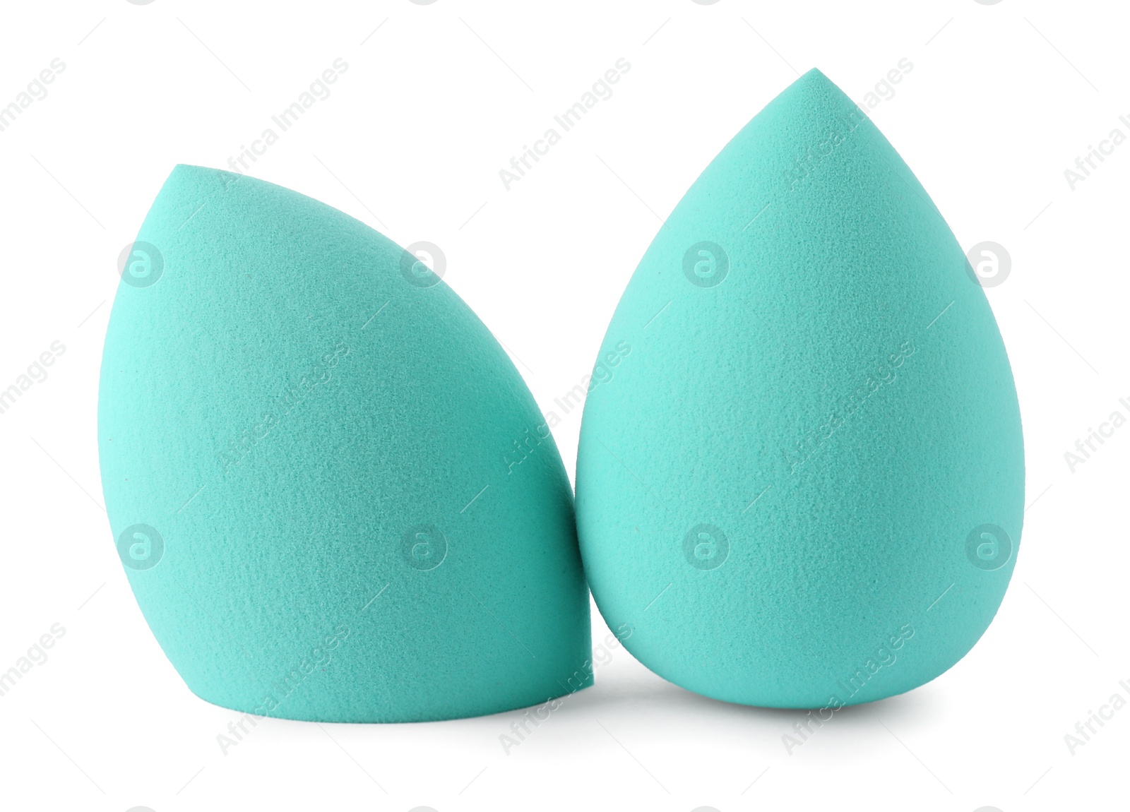Photo of Two make up sponges isolated on white