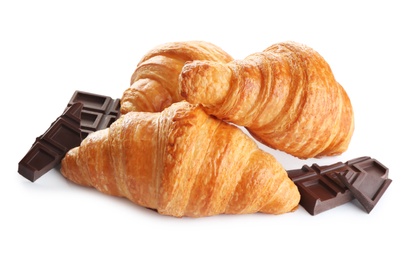 Photo of Tasty croissants with chocolate on white background. French pastry