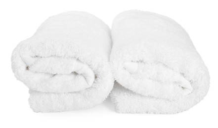 Two rolled terry towels isolated on white