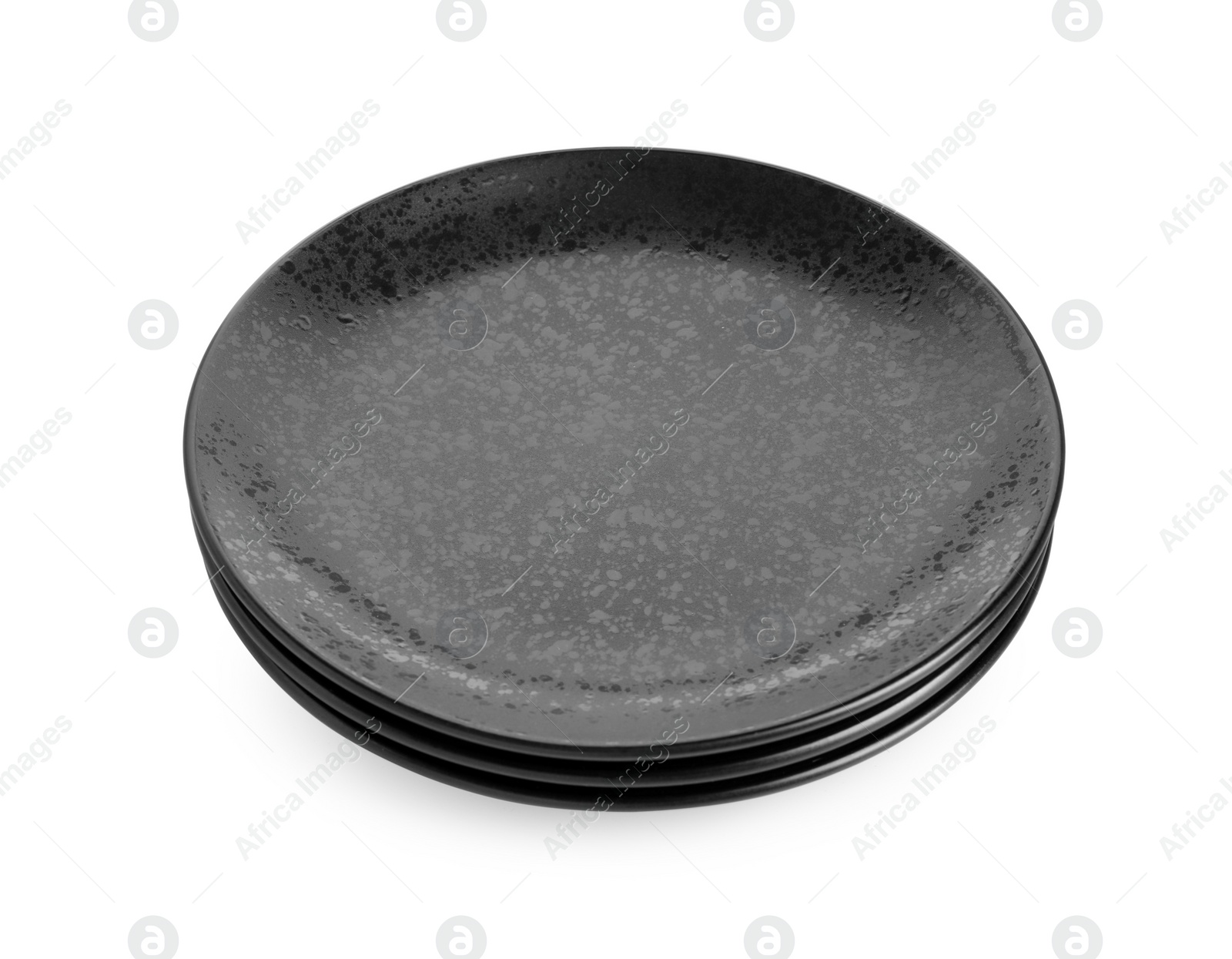 Photo of Three black ceramic plates isolated on white