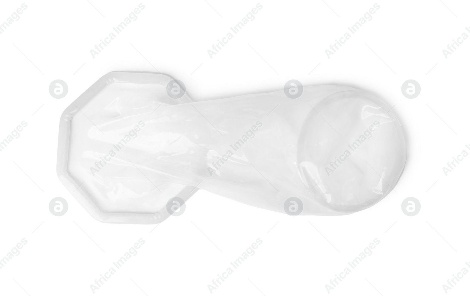 Photo of Unrolled female condom isolated on white, top view. Safe sex