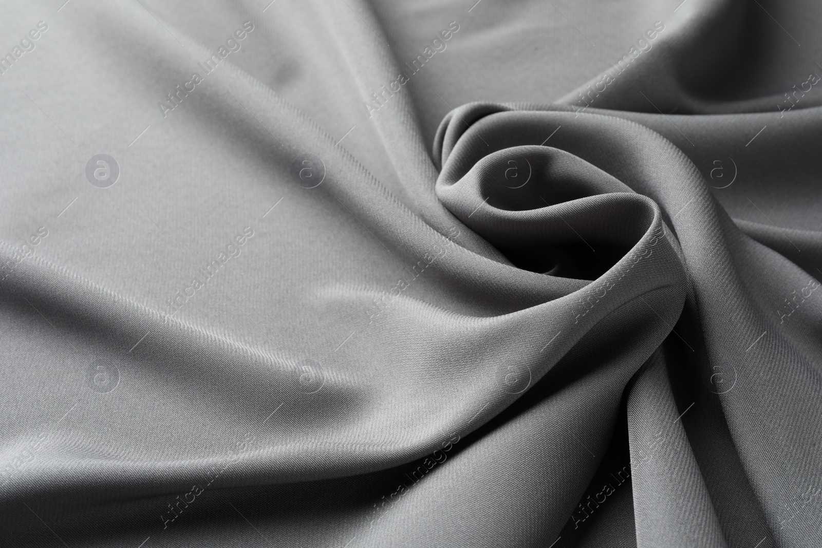 Photo of Texture of grey crumpled silk fabric as background, closeup