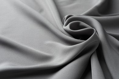 Texture of grey crumpled silk fabric as background, closeup