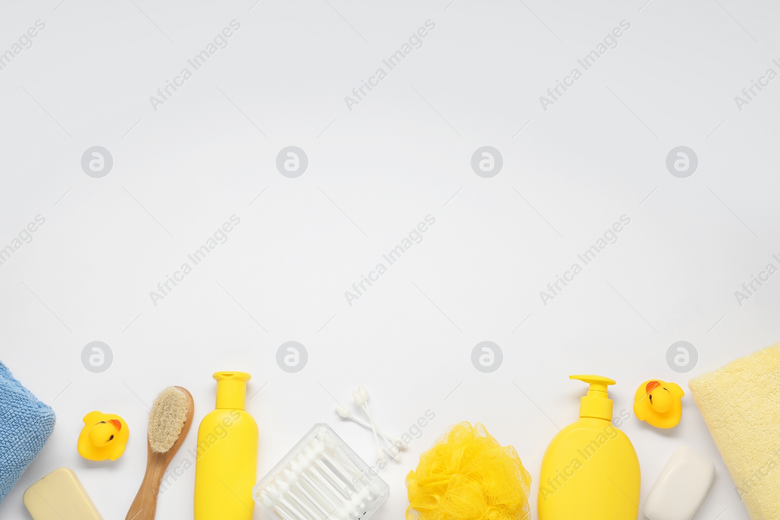 Photo of Baby bath accessories and care products on white background, flat lay. Space for text