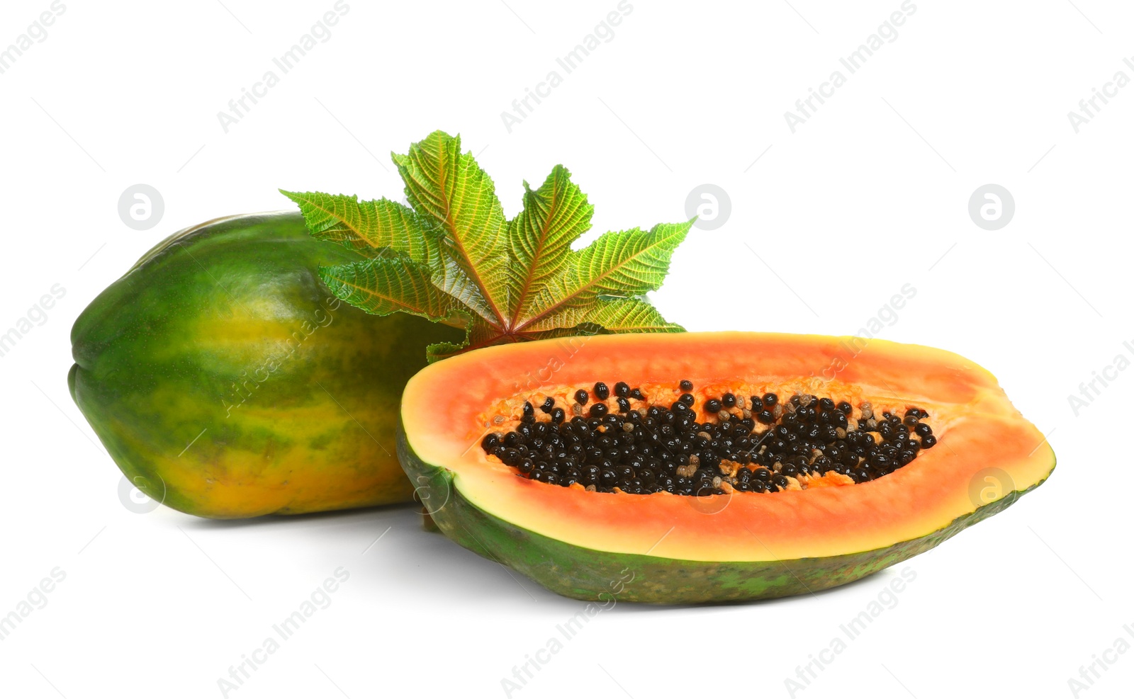 Photo of Fresh juicy ripe papayas with leaf on white background