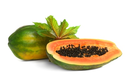 Photo of Fresh juicy ripe papayas with leaf on white background